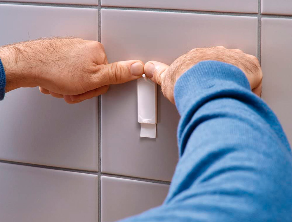 CLAVO AUTOADHESIVO TESA SUJECION HASTA 2 KG USO AZULEJOS REMOVIBLE BLISTER DE 2 UNIDADES