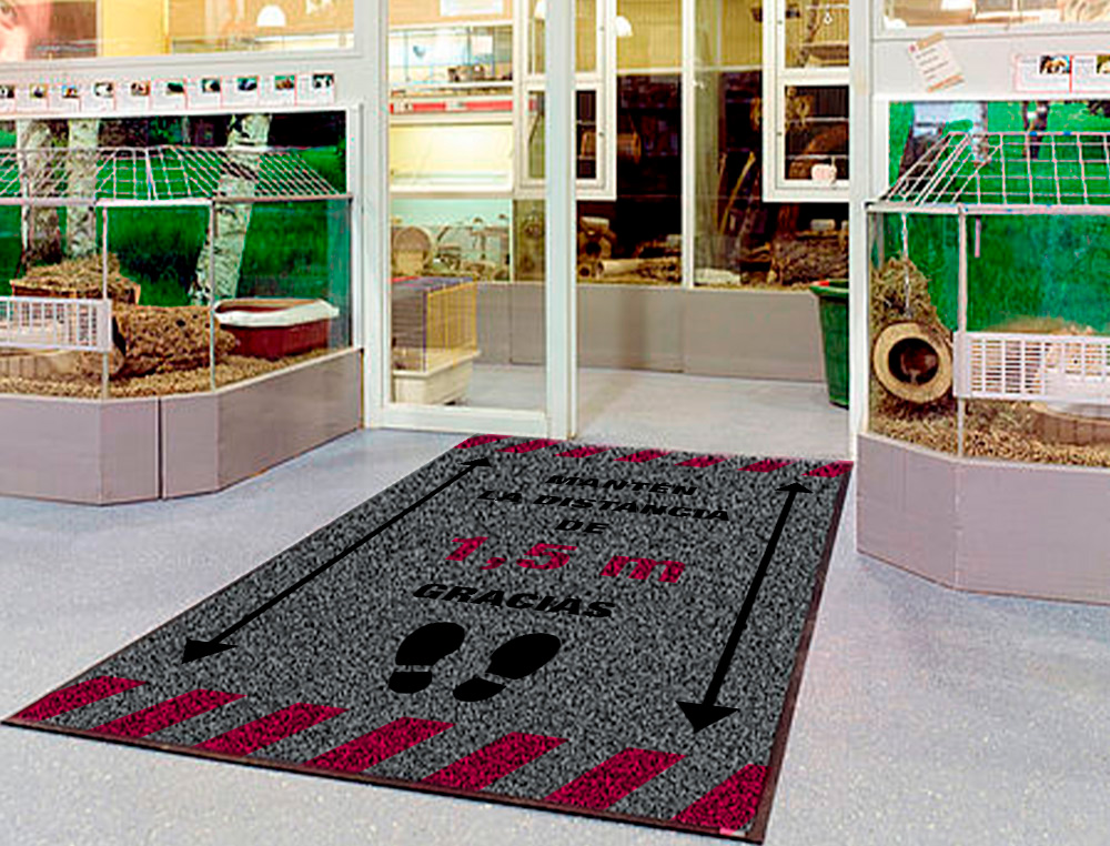 ALFOMBRA PARA SUELO DE PASO NOVUS MANTEN LA DISTANCIA DE 1,5 M GRACIAS FONDO GRIS 85X150 CM