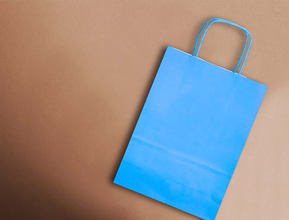 BOLSA PAPEL Q-CONNECT CELULOSA CELESTE M CON ASA RETORCIDA 270X370X12 MM