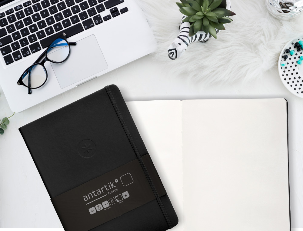 CUADERNO CON GOMILLA ANTARTIK NOTES TAPA DURA A4 HOJAS LISAS NEGRO 100 HOJAS 80 GR FSC