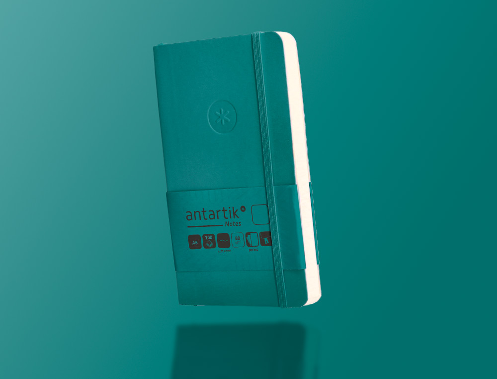 CUADERNO CON GOMILLA ANTARTIK NOTES TAPA BLANDA A6 HOJAS LISAS VERDE AGUAMARINA 100 HOJAS 80 GR FSC