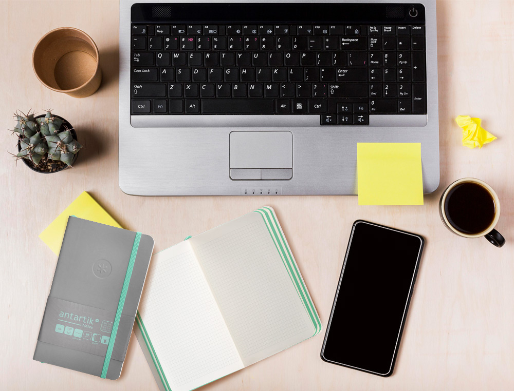 CUADERNO CON GOMILLA ANTARTIK NOTES TAPA BLANDA A6 CUADRICULA GRIS Y TURQUESA 100 HOJAS 80 GR FSC