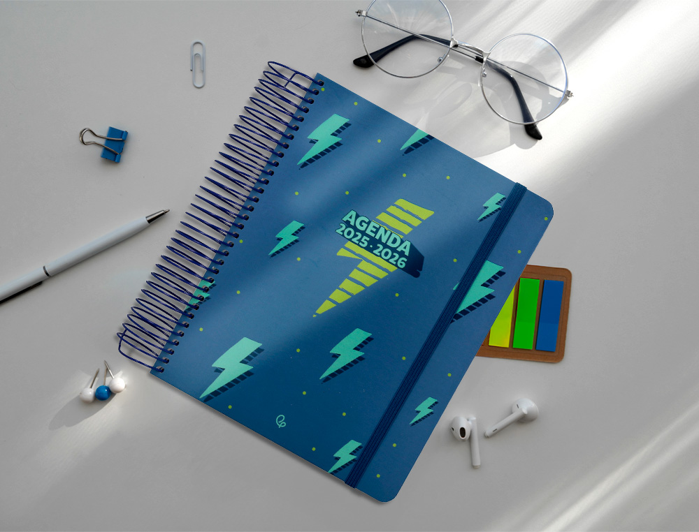 AGENDA ESCOLAR LIDERPAPEL 25-26 ESPIRAL PATTERNS RAYOS AZUL DIA PAGINA A5 BILINGÜE PAPEL FSC 80 GR