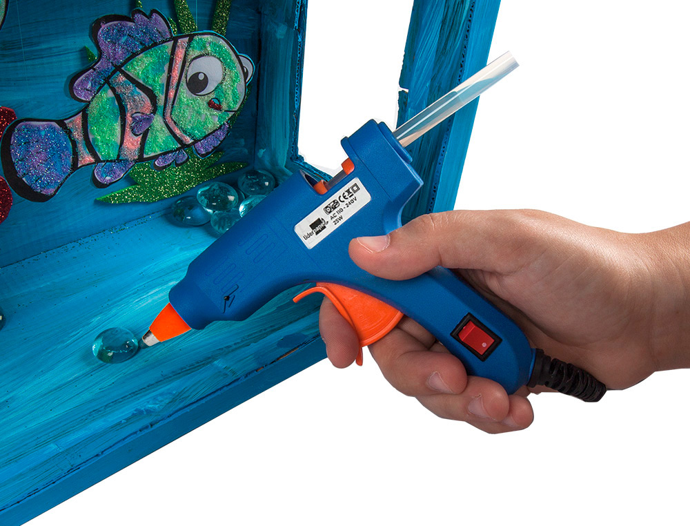 PISTOLA TERMOFUSIBLE MINI LIDERPAPEL DE 25W CON GATILLO DISPENSADOR Y 2 BARRAS DE REPUESTO DE 7 MM DIAMETRO X 100 MM